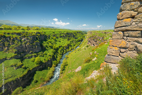 Old Armenian Lori Berd fortress wall and picturesque canyon and gorge carved into the rocks by Urut and Dzoraget River photo