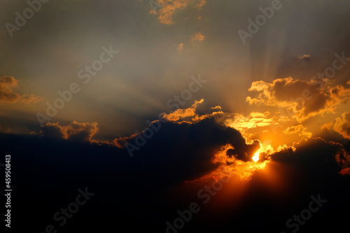 Sunlight Sun Rays Shining Through Clouds in Sky Symbolizing Hope © Lane Erickson