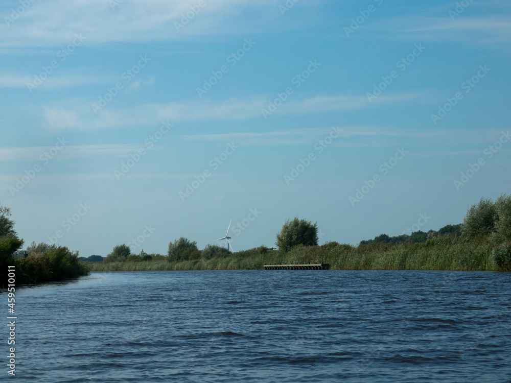 Panorama from Kükhernster Feart canal between Leeuwarden and Groningen in Friesland, Netherlands. Very popular with houseboat holidays. Place for Text.
