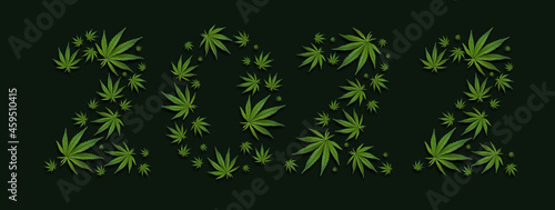 New year number 2022 from cannabis leaves  marijuana on black background