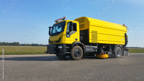 Cleaning machine asphalt at the international airport