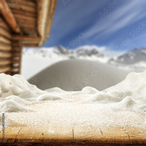 Wooden desk cover of snow and winter time in mountains.  © magdal3na