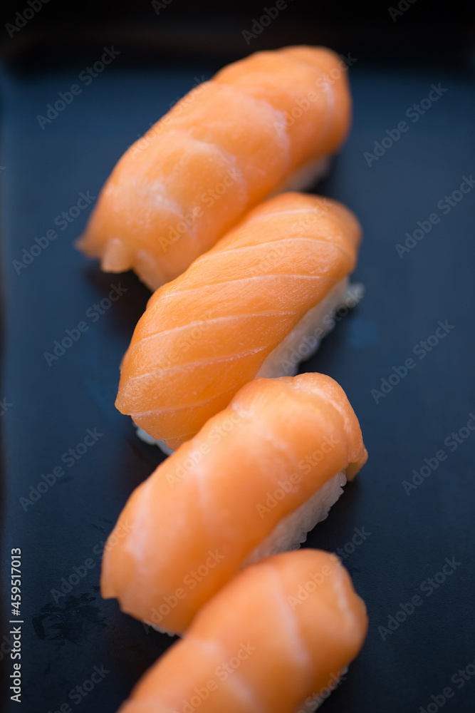 Japanese sushi Maki and rolls show food background Japanese sushi Maki and rolls show food background