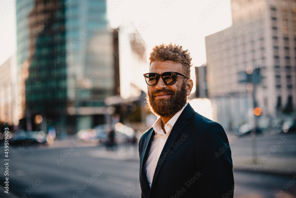 Male professional wearing sunglasses on street Male professional wearing sunglasses on street