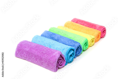 Canvas Print The row of the different colorful micro fibre rags ordered in a white background