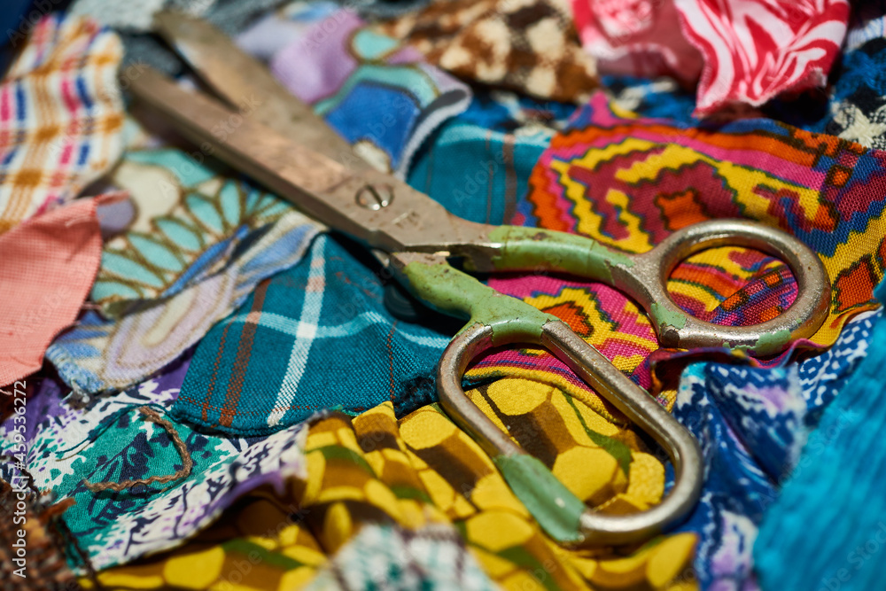 Fototapeta premium Various scraps of tissue, multicolored pieces of fabric, diversity concept