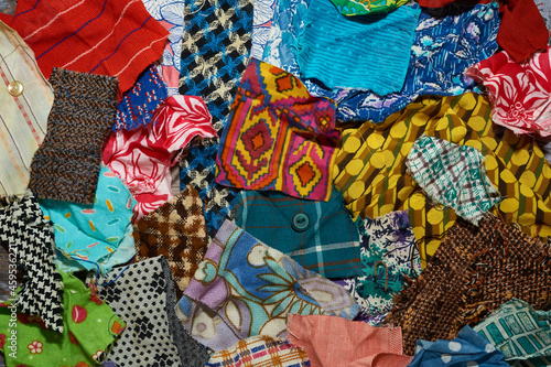 Various scraps of tissue, multicolored pieces of fabric, diversity concept