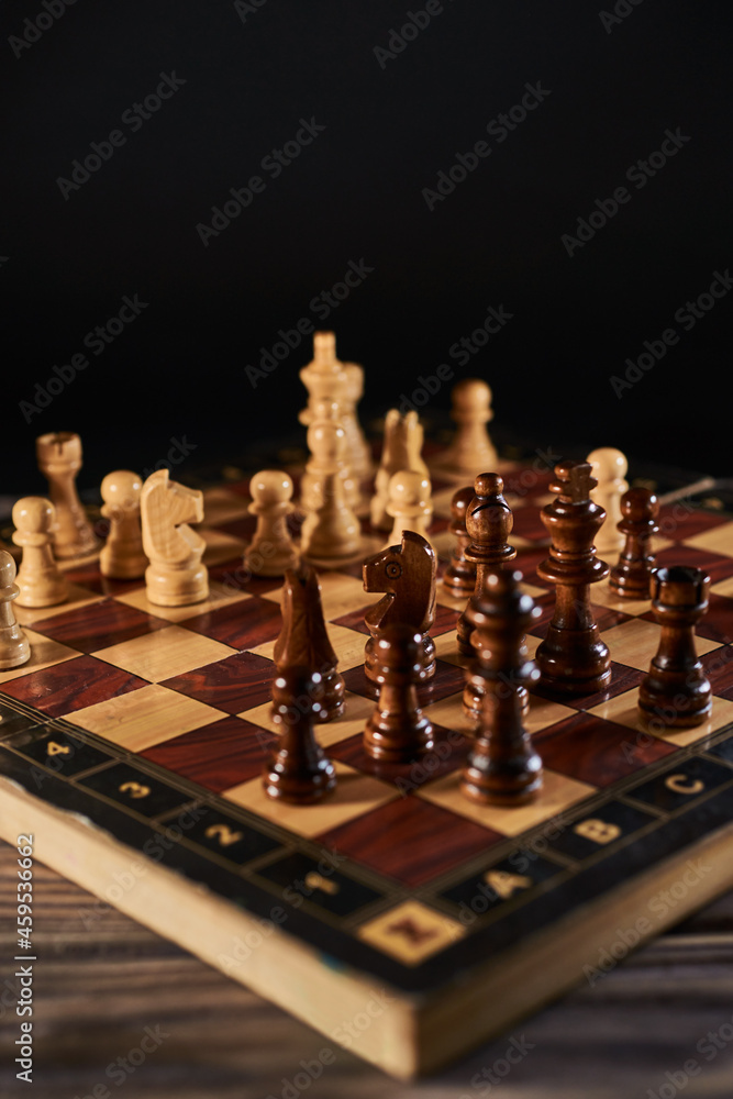 Chess figures on chessboard on retro background, Queen gambit Chess figures on chessboard on retro background, Queen gambit
