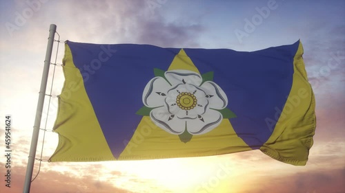 West Yorkshire flag, England, waving in the wind, sky and sun background photo