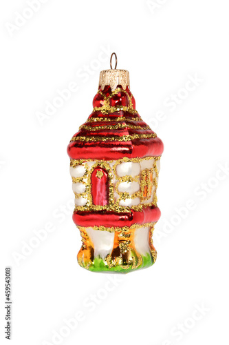 Vintage glass toy for decoration of Christmas tree. Fairy house on chicken legs. Close-up, isolated on white background for your design.