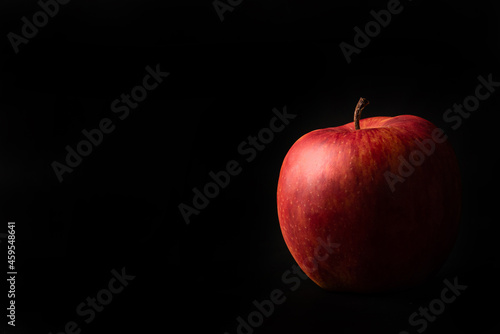 Apples, a beautiful apple arranged on black background, Low Key portrait, selective focus.