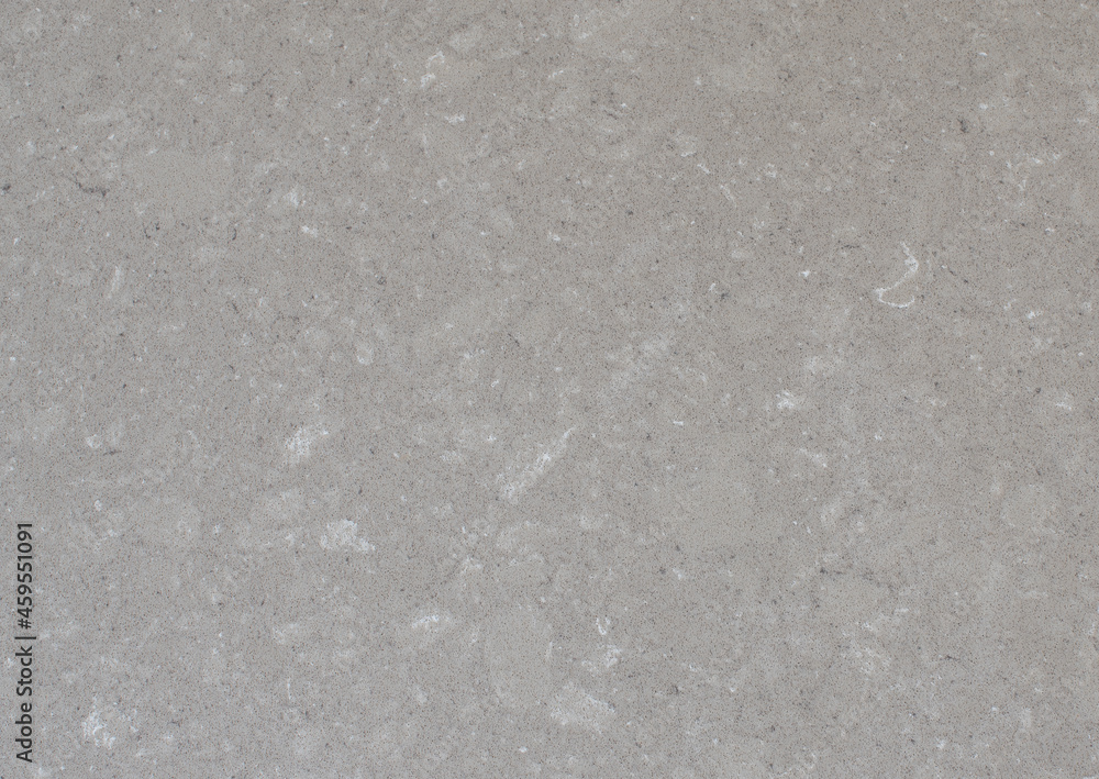 Grey color man-made quartz counter top for use as background.