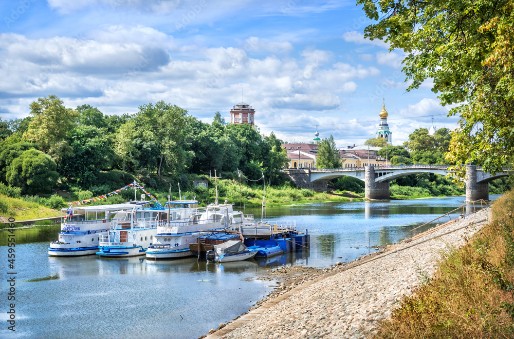 Fototapeta premium Motor ships at the pier on the river in Vologda on a summer sunny day