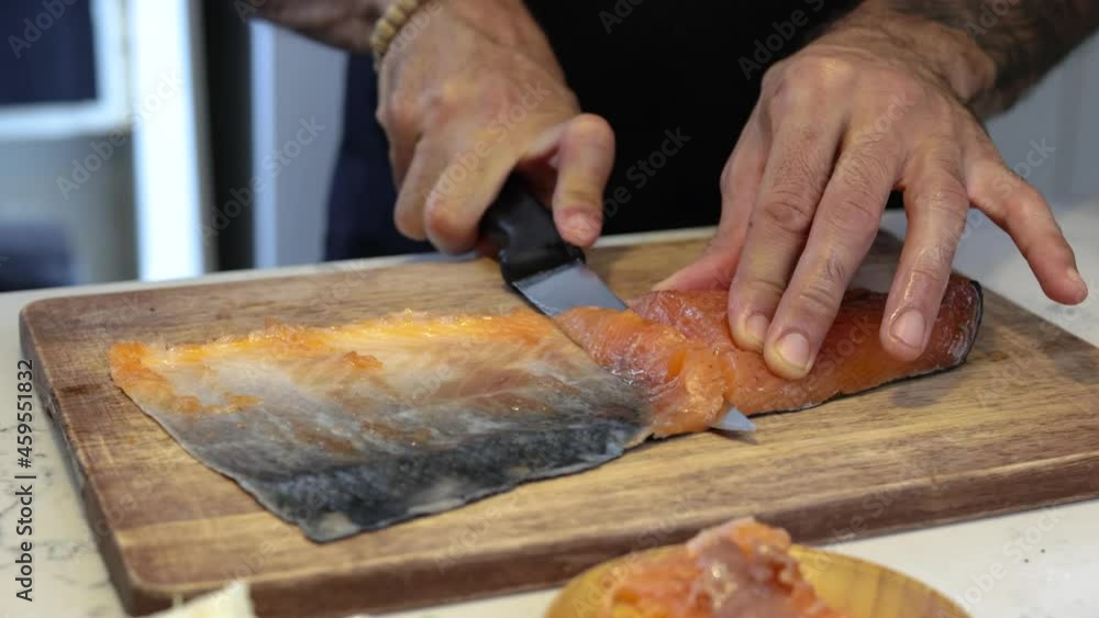 Chef Cutting salmon fish Chef Cutting salmon fish