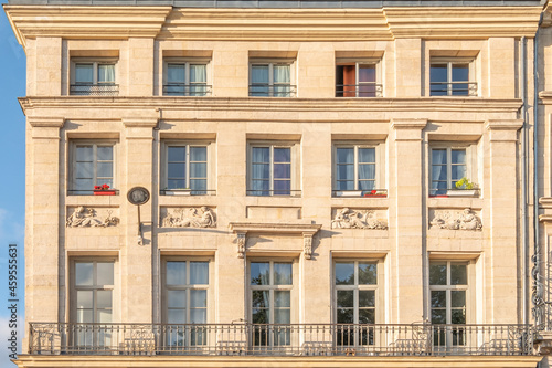 Typical facade of a French residential building in Normandy, France