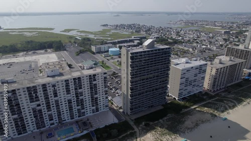 Drone moving parallax over Ocean City MD high rise ocean background photo