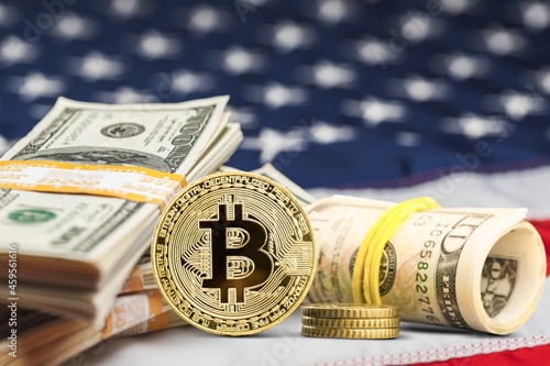 Concept for investors in cryptocurrency, Bitcoins on the background of the flag USA
