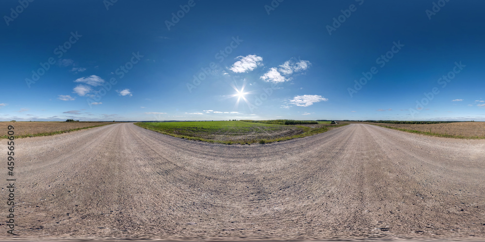 360 hdri panorama on no traffic white sand gravel road among fields with clear sky with some clouds  in equirectangular spherical projection, VR AR content.  seamless