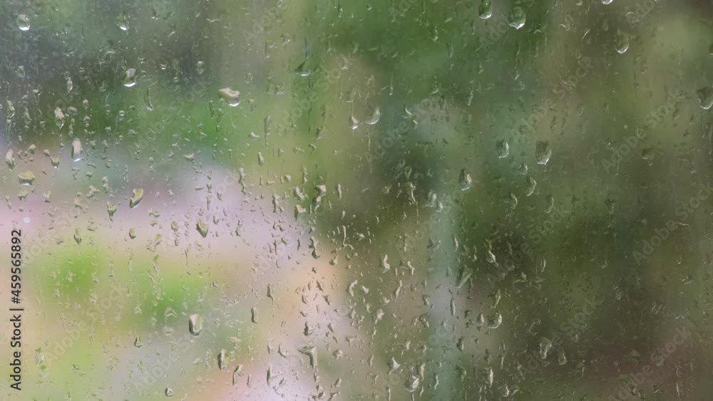 raindrops on a glass window, autumn concept, window on a rainy day raindrops on a glass window, autumn concept, window on a rainy day