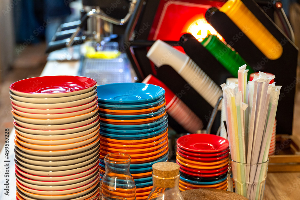 Empty clean washed dishes on a table in a restaurant, cafe, bar. Empty clean washed dishes on a table in a restaurant, cafe, bar.