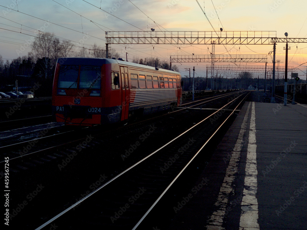 Last evening train at the far station. Long distance trains. Russia, Moscow region. Last evening train at the far station. Long distance trains. Russia, Moscow region.