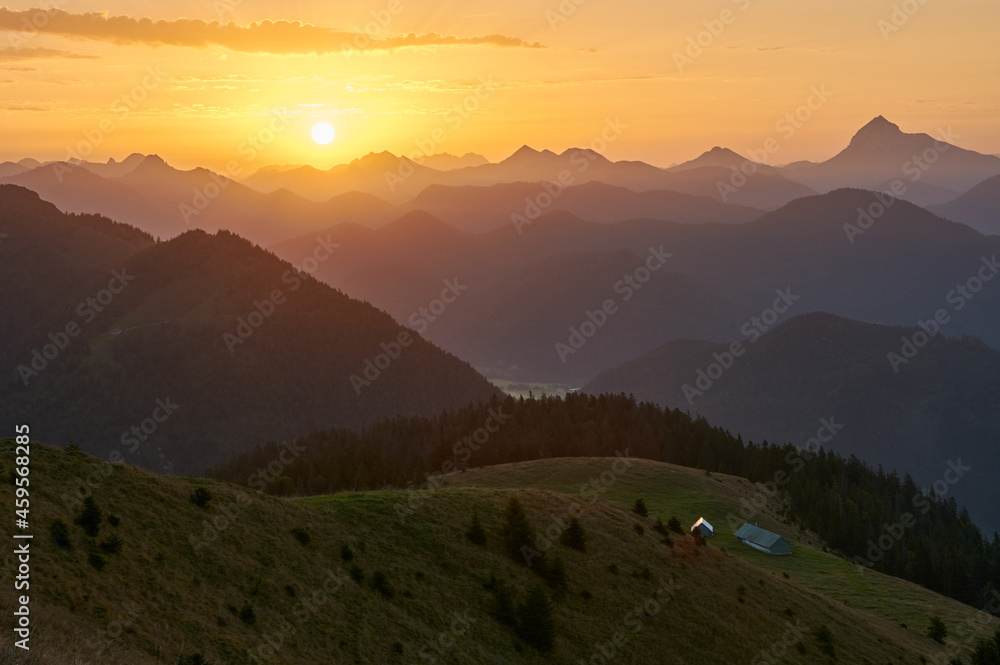 Scenic sunrise above a beautiful mountain range. Moutain range during sunrise.