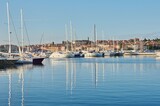 Harbour in Rovinj, Croatia. Boats reflecting in the water.