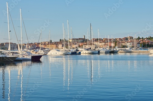 Harbour in Rovinj, Croatia. Boats reflecting in the water.