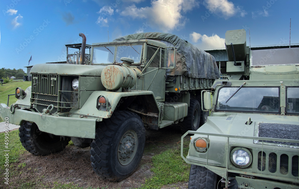 military truck on the road military truck on the road