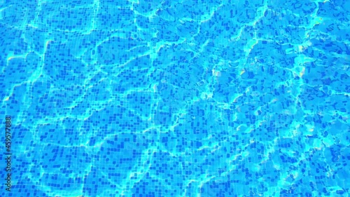 Aerial top down view of swimming pool water surface.