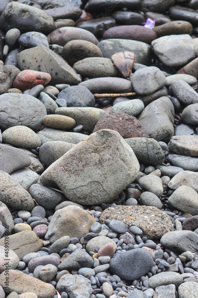 Stacked Beach stones and pebble texture for industrial background Stacked Beach stones and pebble texture for industrial background