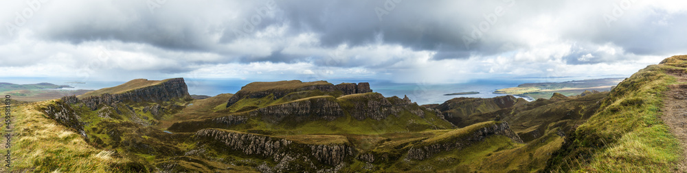 Panoramic view over rocky landscape of landslide Quiraing on a cloudy autumn day, Isle of Skye, Scotland