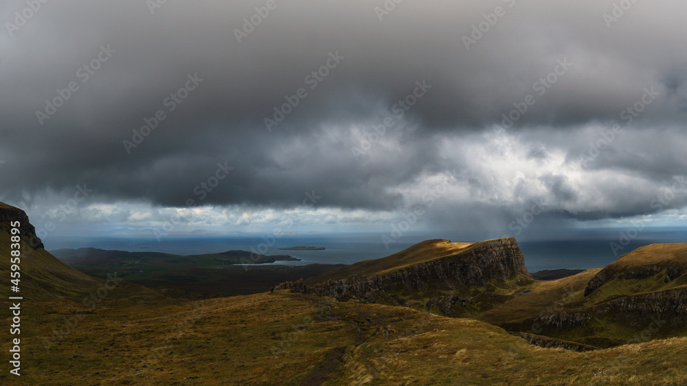 View over rocky landscape of landslide Quiraing on a raniy moody autumn day, Isle of Skye, Scotland View over rocky landscape of landslide Quiraing on a raniy moody autumn day, Isle of Skye, Scotland