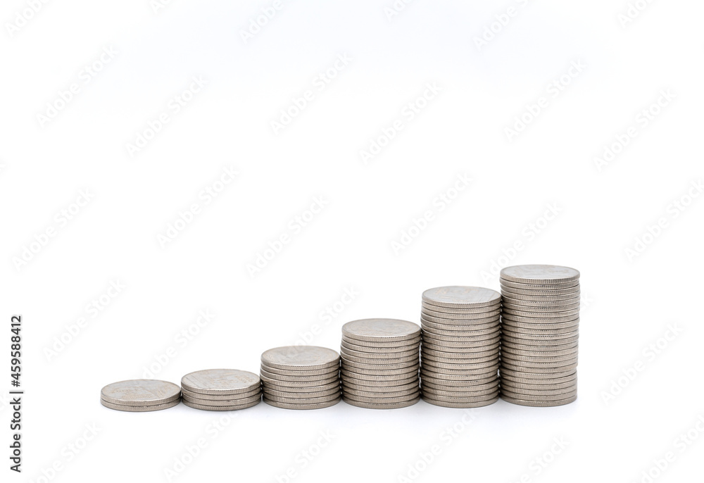 Money and Financial Concept. Closeup of stack of silver coins on white background. Money and Financial Concept. Closeup of stack of silver coins on white background.