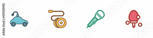 Set Radio controlled car toy, Yoyo, Microphone and Racket icon. Vector