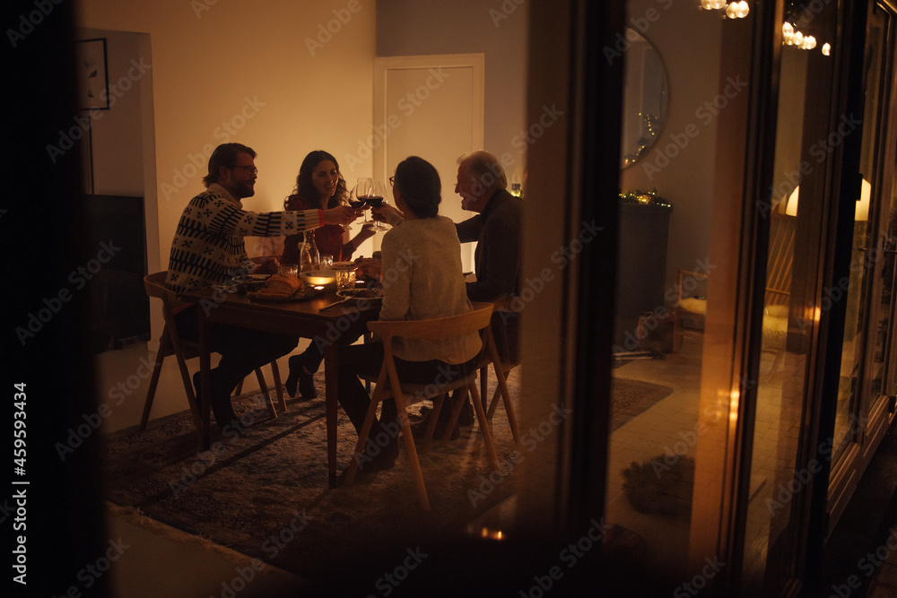 Family having a Christmas eve dinner Family having a Christmas eve dinner