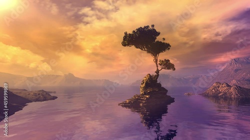 Golden sunrise over a mountain lake with an island. photo