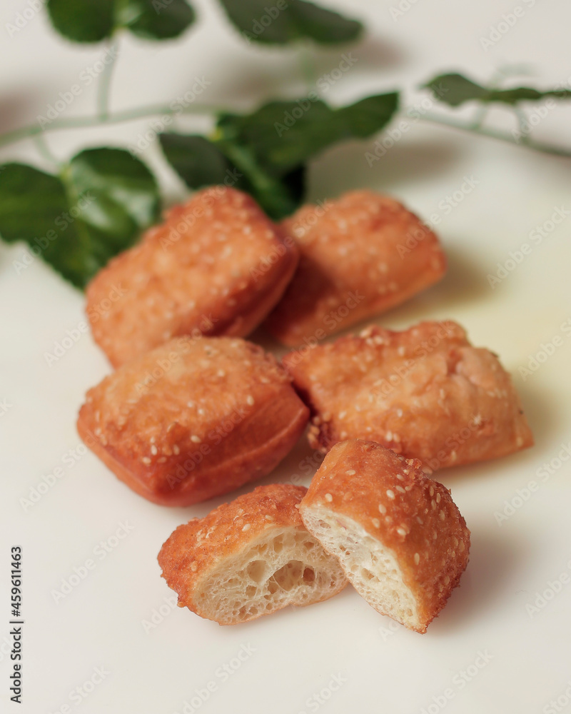 Fried bread to start your morning breakfast. Fried bread has a sweet and savory taste. Pairs well with a cup of hot tea. This bread can be found on the side of the road. Fried Mockup. Focus blur. Fried bread to start your morning breakfast. Fried bread has a sweet and savory taste. Pairs well with a cup of hot tea. This bread can be found on the side of the road. Fried Mockup. Focus blur.
