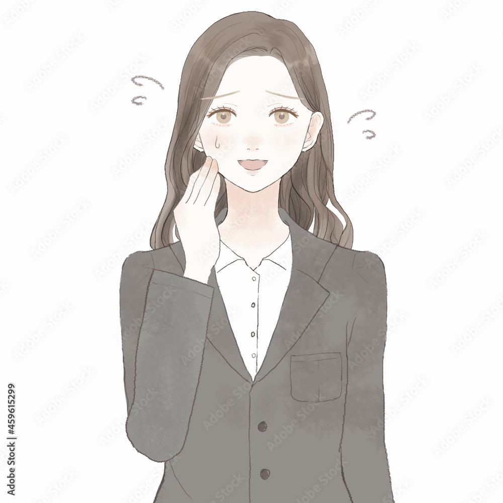 愛想笑いをするスーツを着た女性