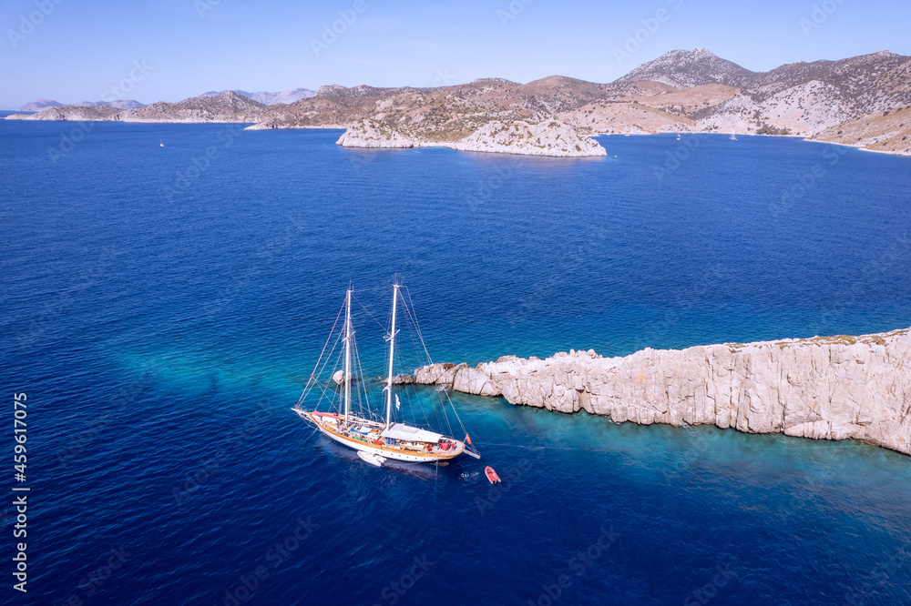 Aerial view of a sailing boat in Loryma Bay (Bozukkale), Bozburun  Marmaris Turkey.