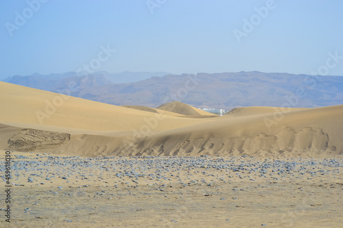 The Maspalomas Dunes are sand dunes located on the south coast of the island of Gran Canaria