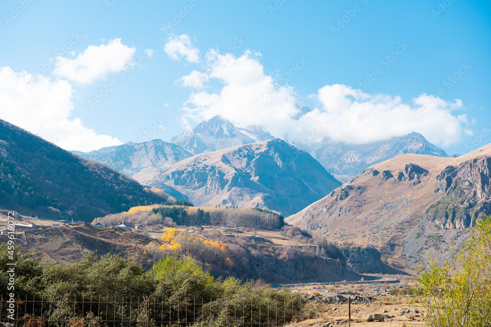 Georgian mountains in autumn sunny day