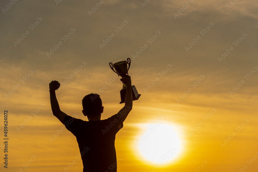 Winner win hands holding golden champion trophy cup prize. Silhouette best award victory hands trophy professional champion challenge team holding gold sport trophy cup. Win-Win sport team concept