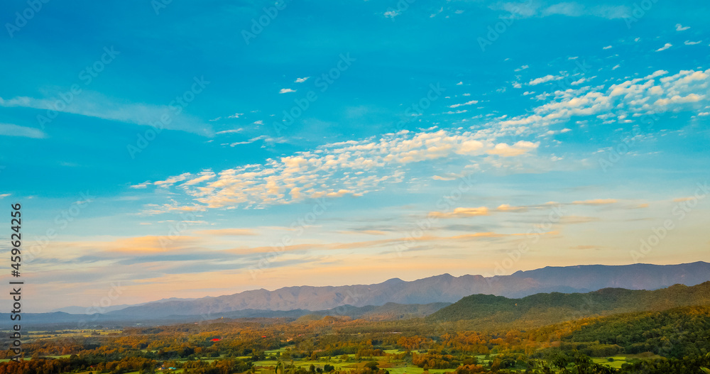 Obraz premium Beautiful landscape mountain green field grass meadow white cloud blue sky on sunny day. Majestic green scenery big mountain hill cloudscape valley panorama view in countryside greenery pasture