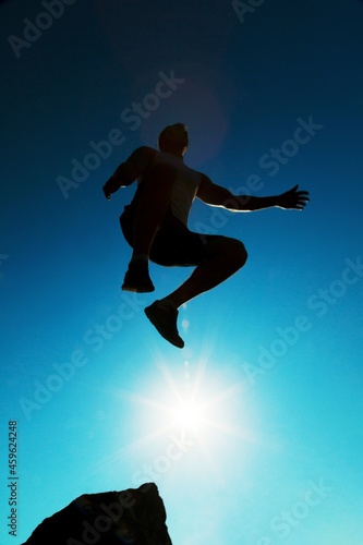 Man jump through the gap. Element of design. © BillionPhotos.com