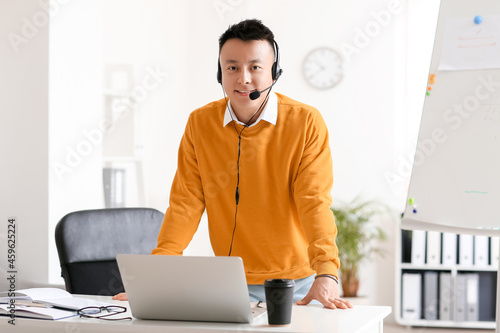 Asian teacher conducting le...