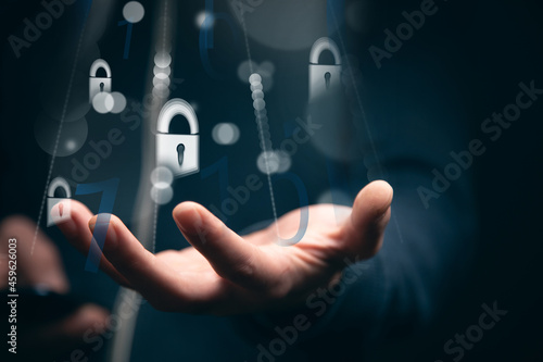 Photos businessman holding a mobile phone with mobile security concept