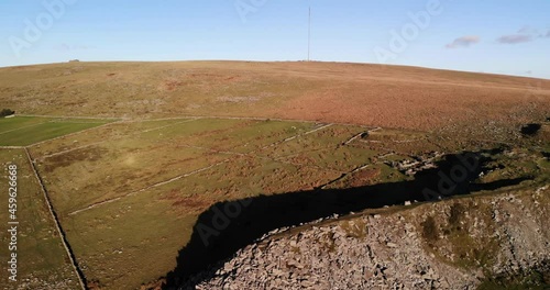 Aerial Over Large Pile Of Stacked Rocks Near Foggintor Quarry. Dolly Forward photo