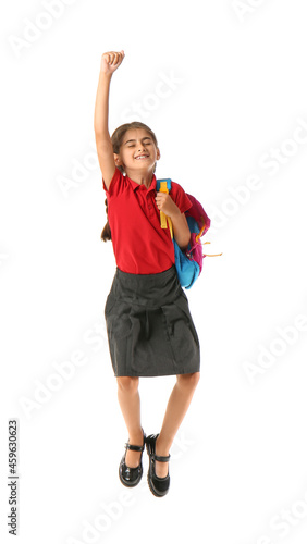 Jumping schoolgirl on white...