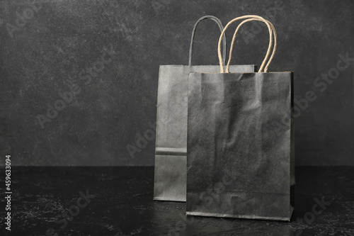 Shopping bags on dark background. Black Friday sale